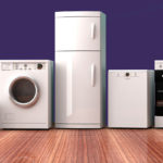 a lineup of appliances (microwave, washing machine, refrigerator, dryer, and oven.