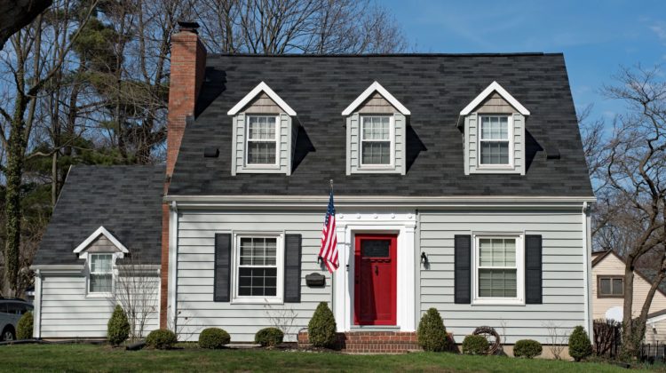 Cape Cod House with Three Dormers & Red Door