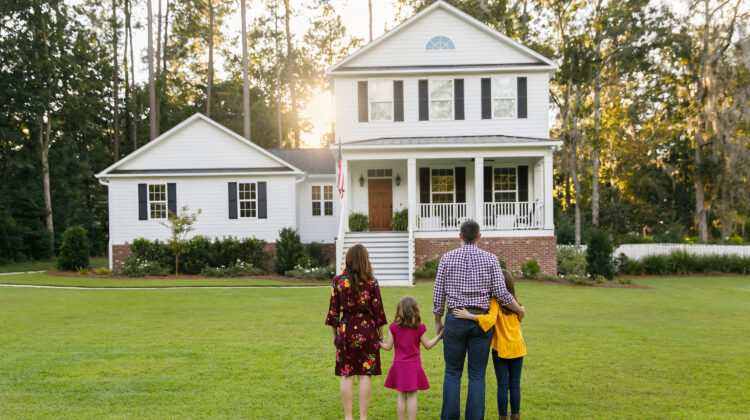family looking at a house