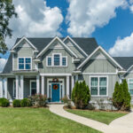 Gray New Construction Modern Cottage Home with Hardy Board Siding and Teal Door with Curb Appeal