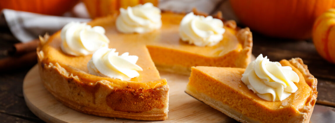 slice of pumpkin pie with whipped cream