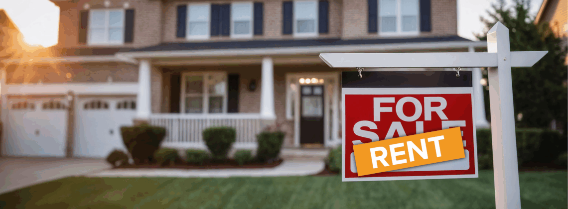 Farm style two story house with For Rent sign in front yard