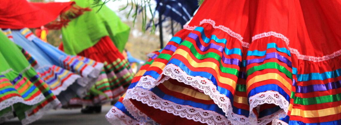 Cinco de Mayo celebration with colorful skirts and dancing